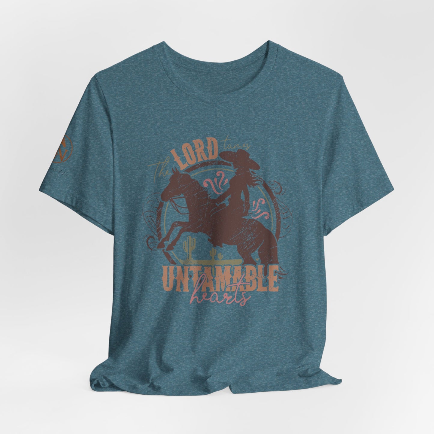 The Lord Tames Untamable Hearts Shirt | Faith Based Western Design | Christian Cowgirl Apparel | Rustic Faith Graphic Tee