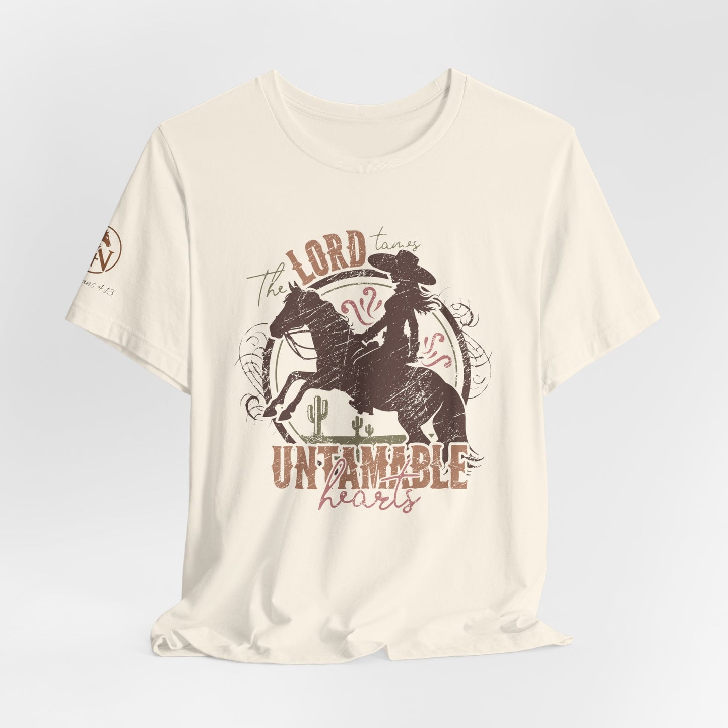 The Lord Tames Untamable Hearts Shirt | Faith Based Western Design | Christian Cowgirl Apparel | Rustic Faith Graphic Tee