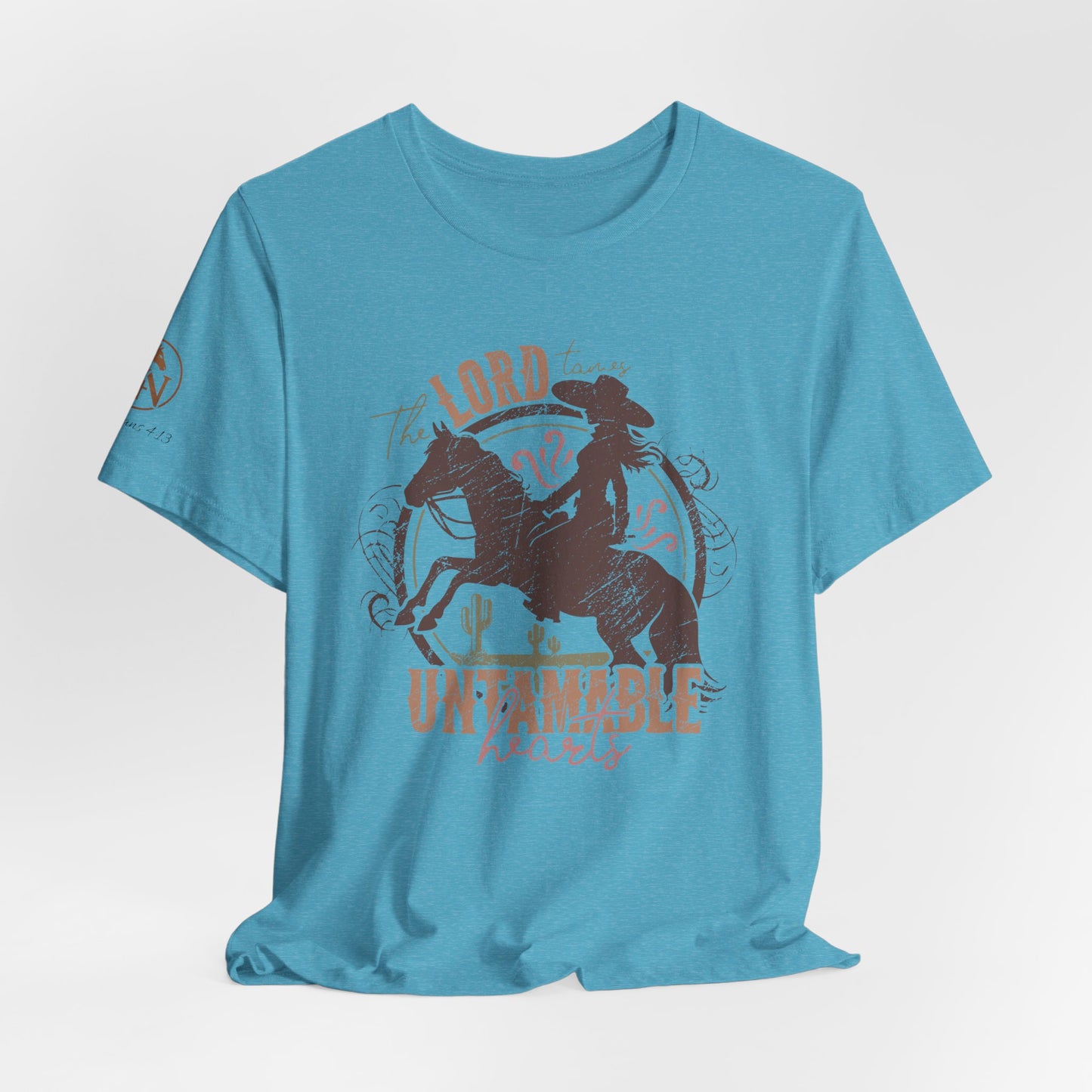 The Lord Tames Untamable Hearts Shirt | Faith Based Western Design | Christian Cowgirl Apparel | Rustic Faith Graphic Tee