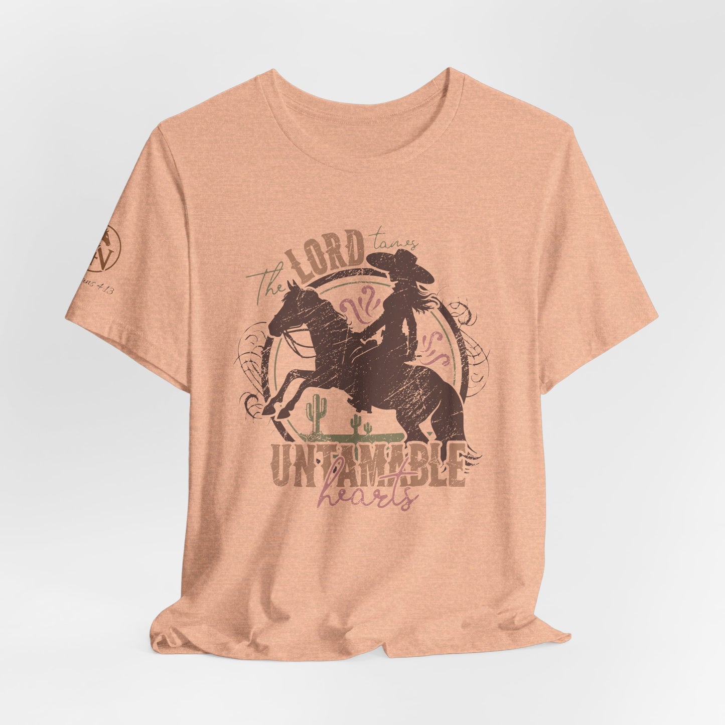 The Lord Tames Untamable Hearts Shirt | Faith Based Western Design | Christian Cowgirl Apparel | Rustic Faith Graphic Tee